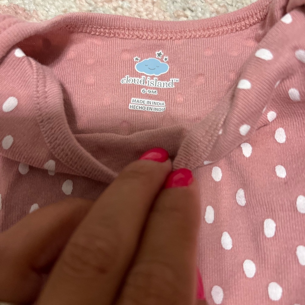6-9 months. Cloud island. Pink one piece with white polka dots.